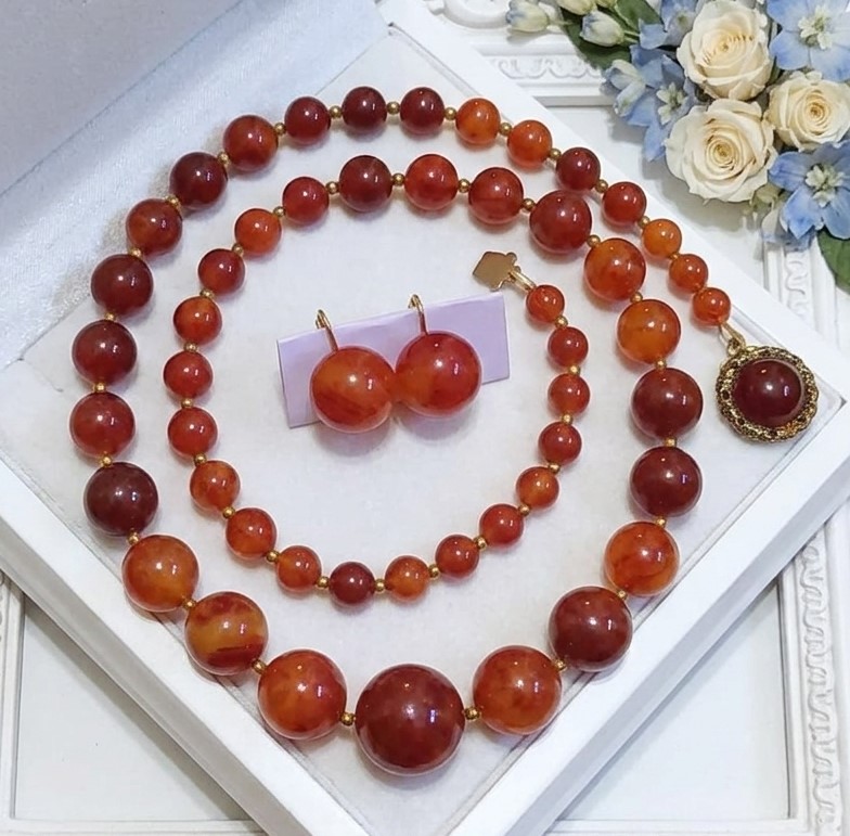 Richelle designer carnelian color beaded necklace and earrings