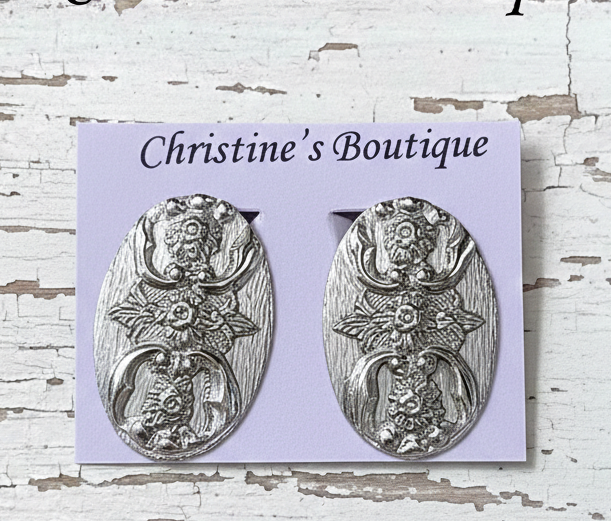 Ornate oval earrings by Whiting & Davis, vintage clip ons