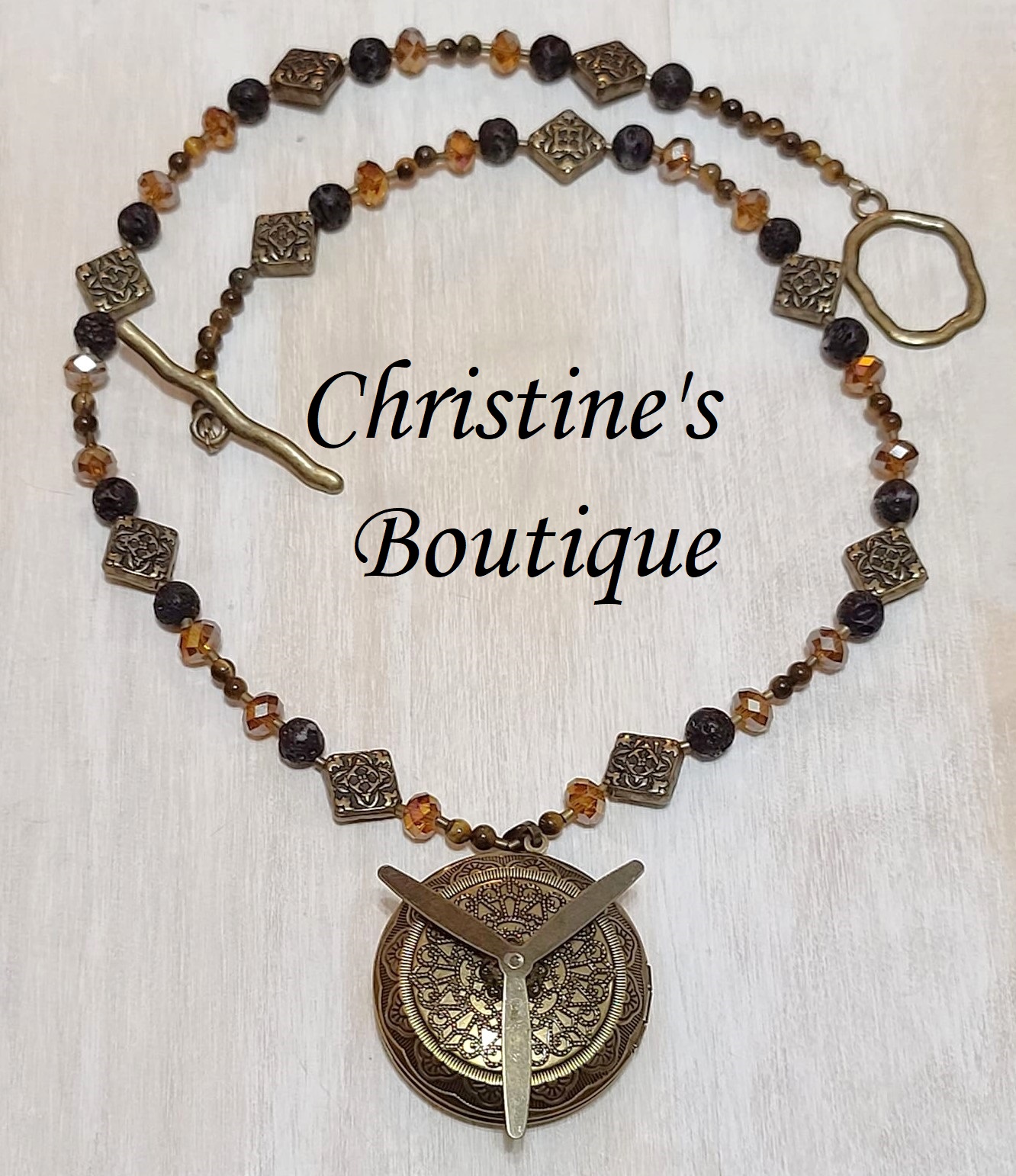 Gemstone locket necklace, lava rock, crystals and tiger eye