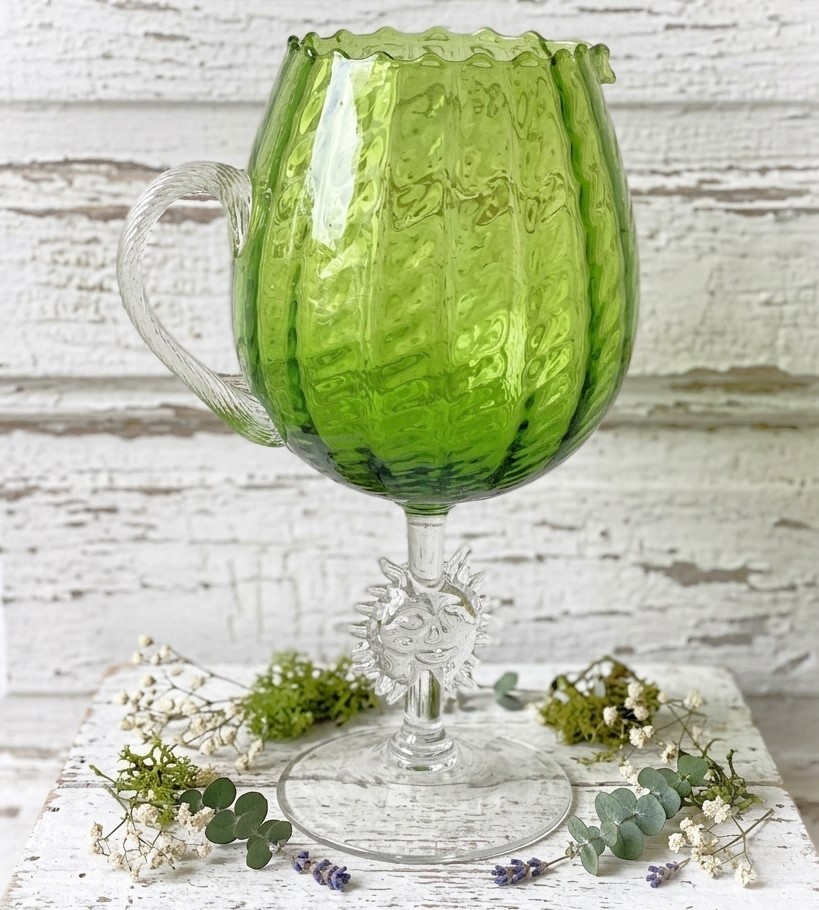 Vintage green glass vase, with sun motif, large pitcher 12 1/2 inches