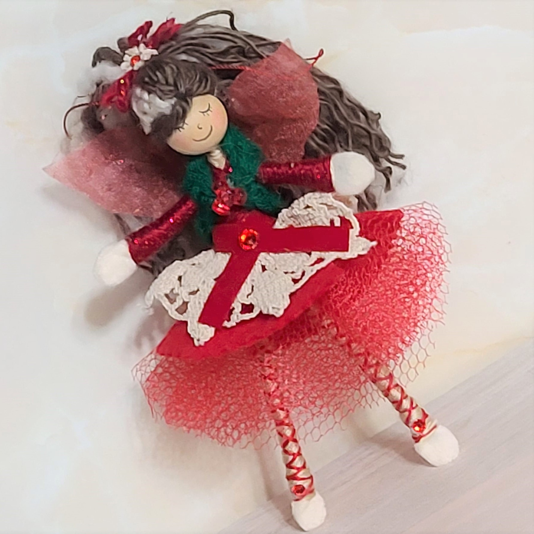 Christmas angel doll with red rings
