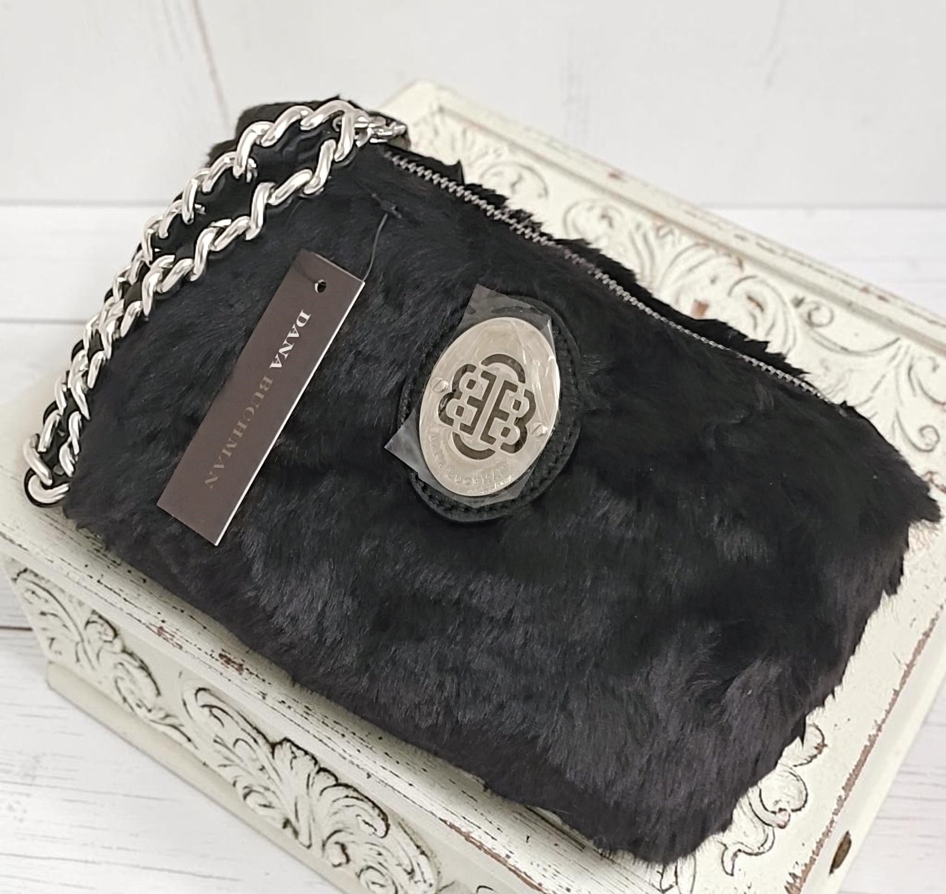 Fur wristlet purse, by Dana Buchman