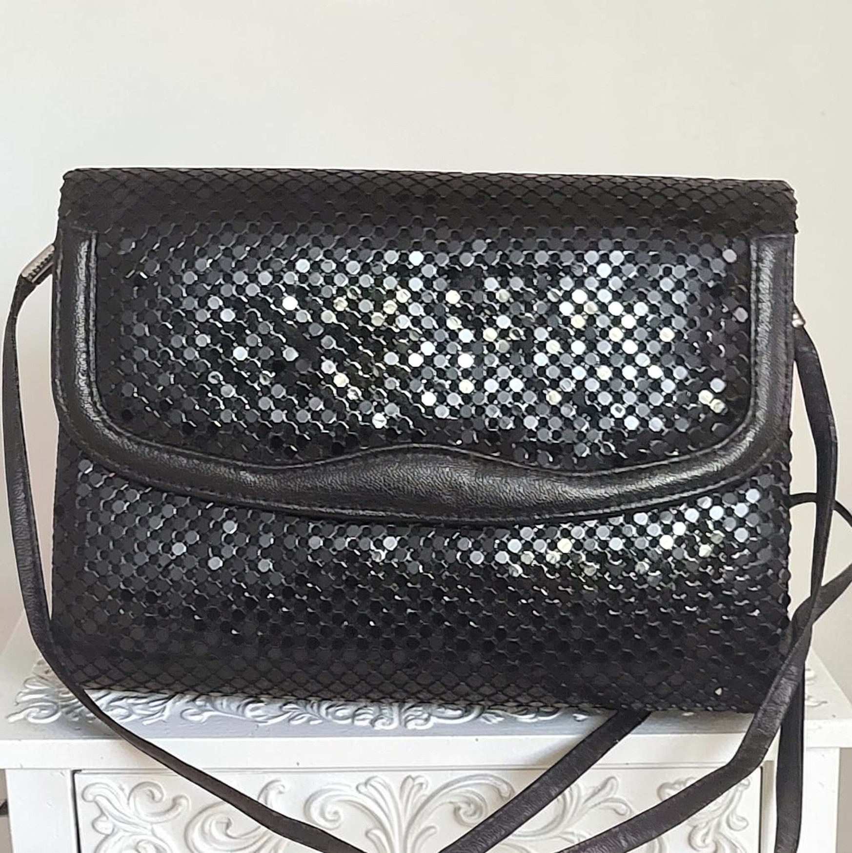 Black handbag, black metal disks, over the shoulder handbag designer Nylites