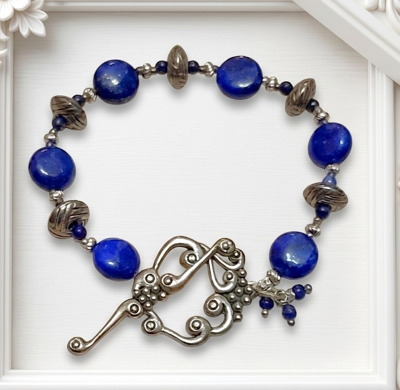 Blue lapis bracelet, bali silver, ornamental grape leaf clasp