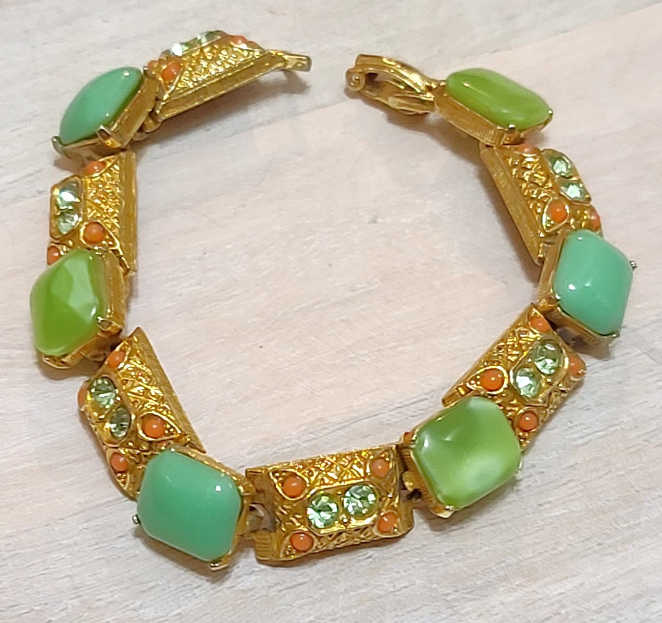 Green cabachon bracelet, vintage with orange cabachons, rhinestones, signed designerr ART