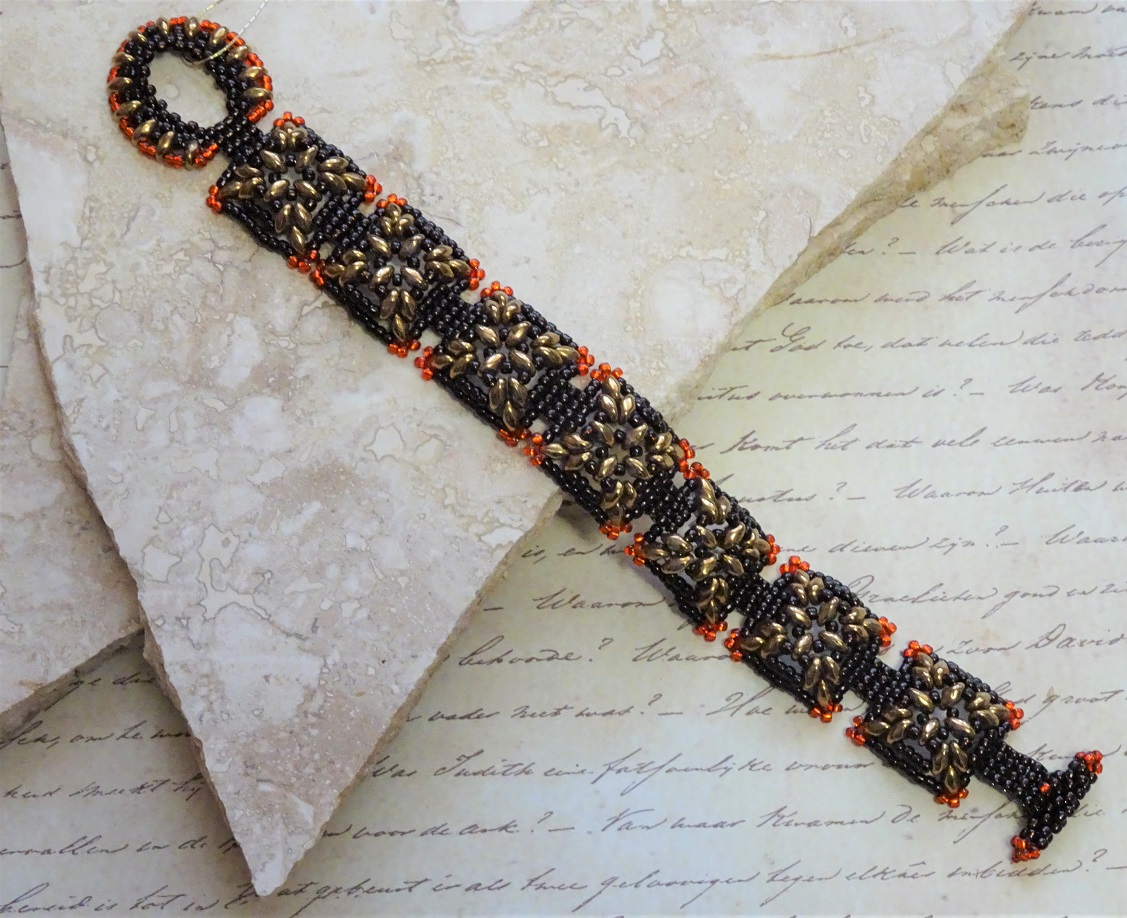 Hand Stitched Puffy Link Bracelet with Brown Tones