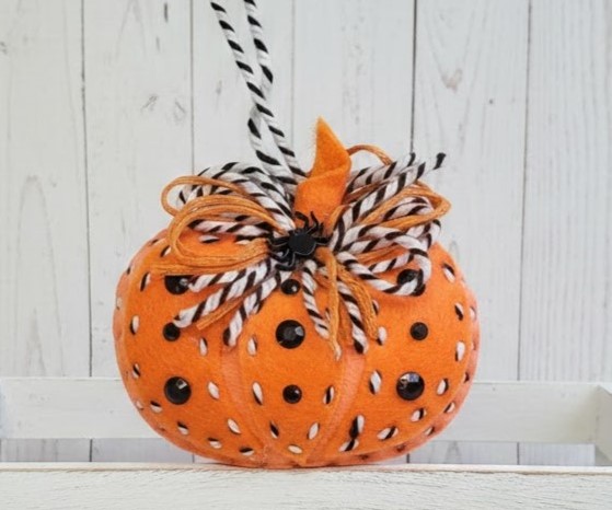 Felt pumpkin ornament - orange with black and white