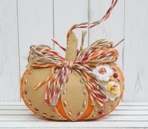 Felt pumpkin ornament - orange & tan w/flowers
