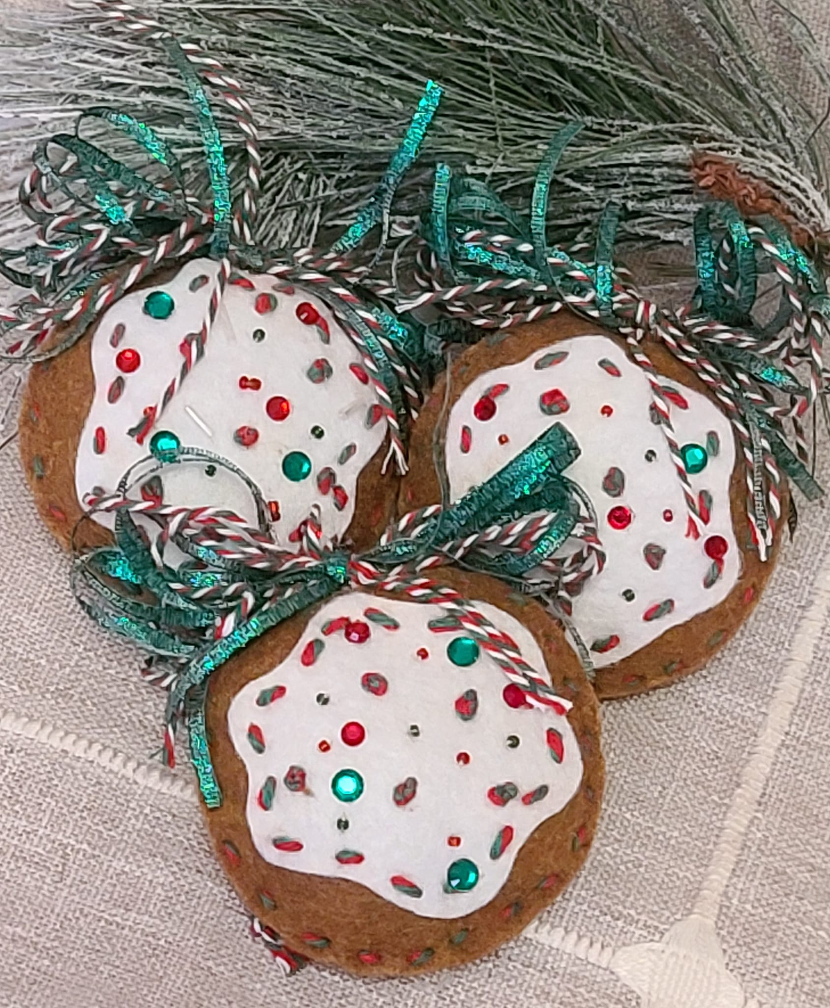 Gingerbread felt and white icing cookie ornament green bows - Click Image to Close