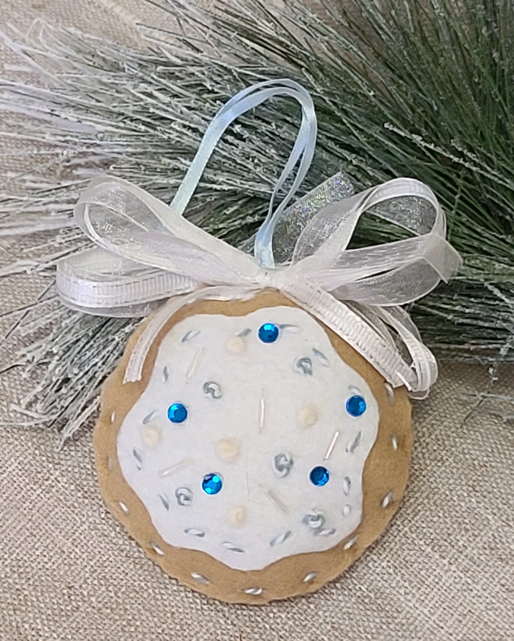 Gingerbread felt and white icing cookie ornament blue sprinkles