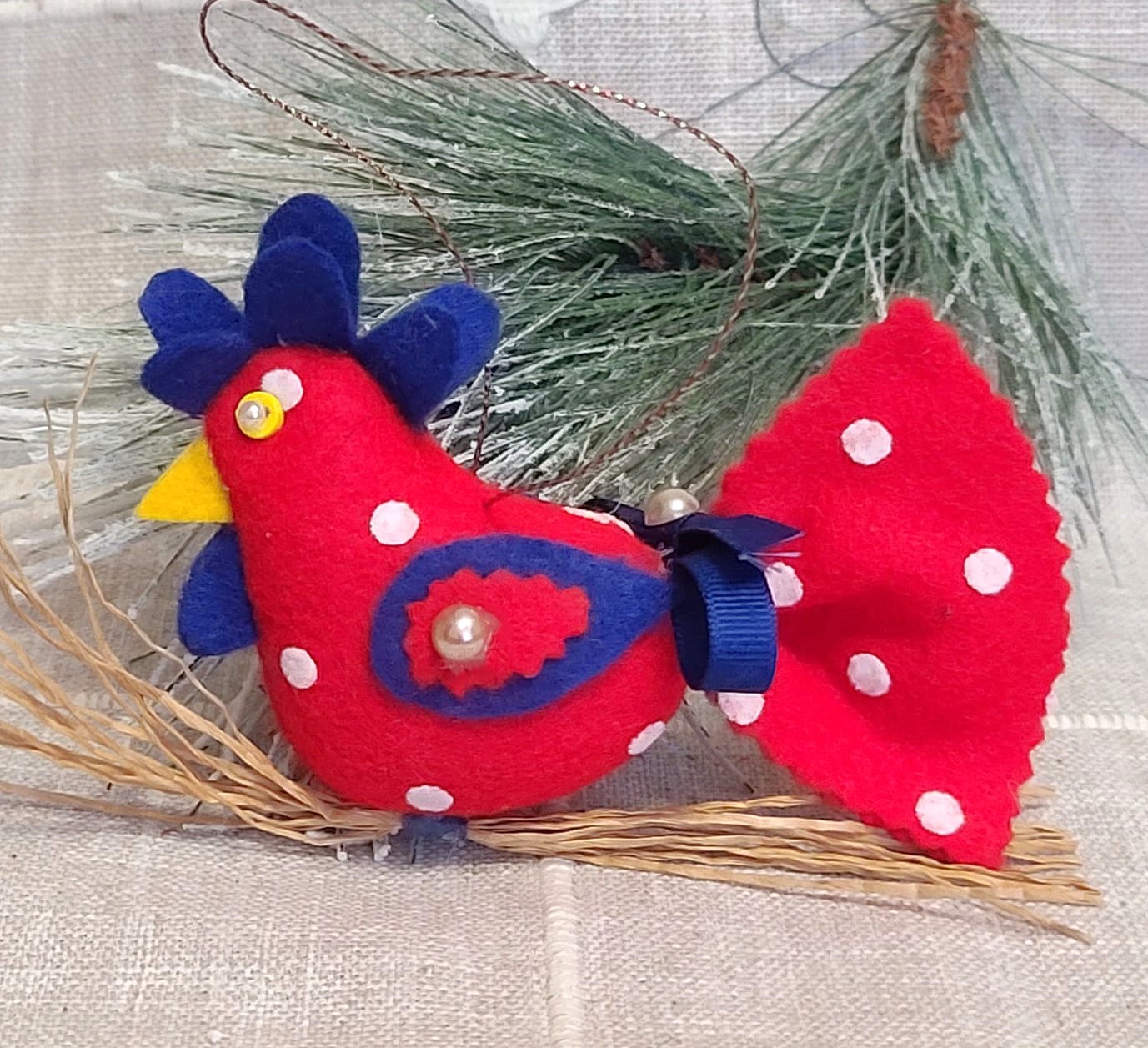 Country polka dot rooster ornament on straw branch -red & blue