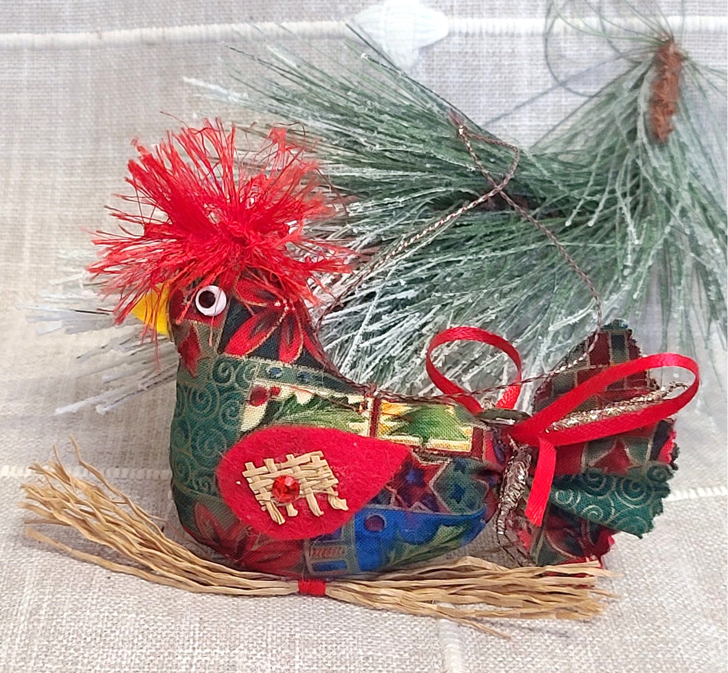 Whimsical bird on straw branch ornament -green and red