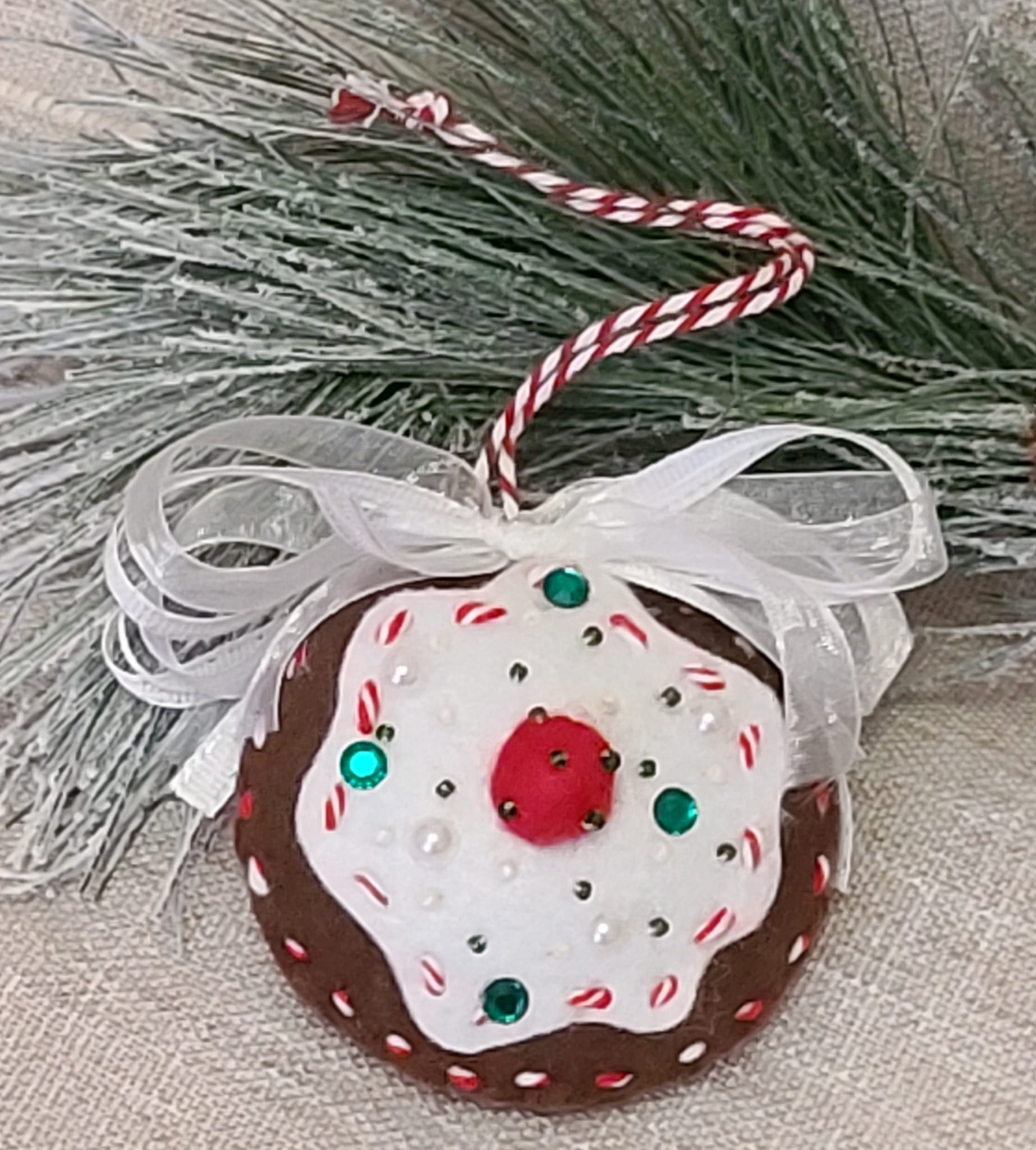 Gingerbread felt and white icing cookie ornament with cherry