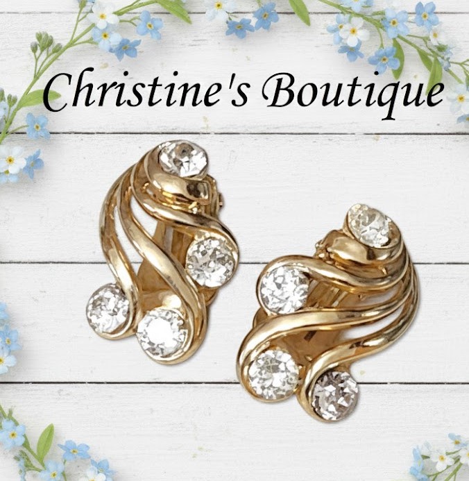 Rhinestone swirled goldtone clip on earrings Rhinestone swirled goldtone clip on earrings