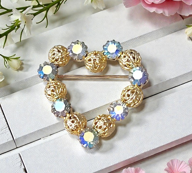 Aurora borealis heart pin, vintage with filigree accents
