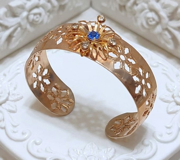 Copper cuff bracelet with cutout design with blue and white rhinestones, vintage bracelet