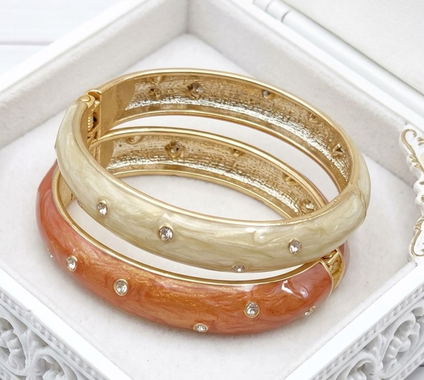 Enamel bracelets with cubic zirconia, oval bangle, set of 2, orange and cream color
