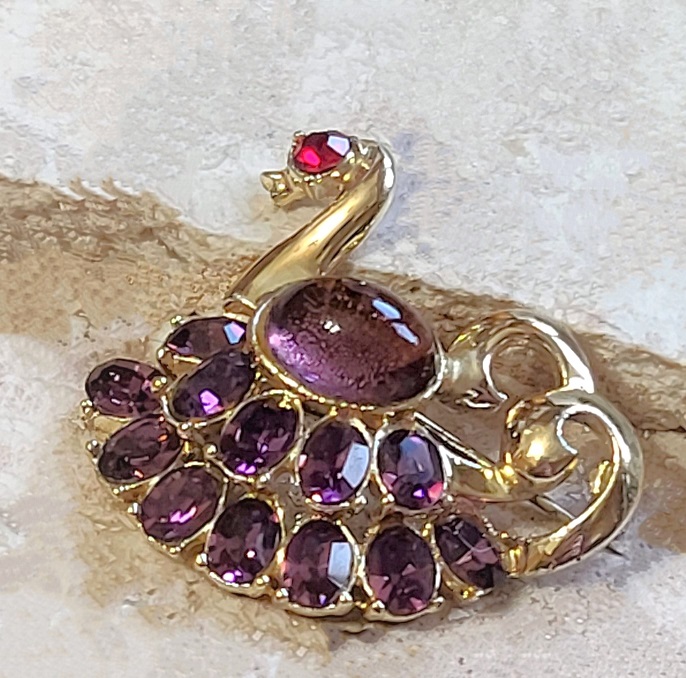 Purple rhinestone pin, bird , with purple rhinestones and a purple jelly belly style cabachon