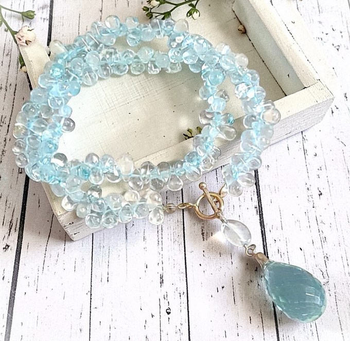 Blue Topaz Lariat Style Necklace with faceted teardrop glass pendant in Sterlilng Silver