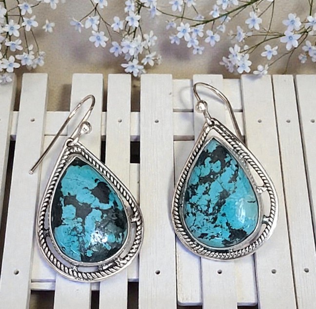 Turquoise gemstone earrings set in 925 sterling silver teardrop turquoise shaped