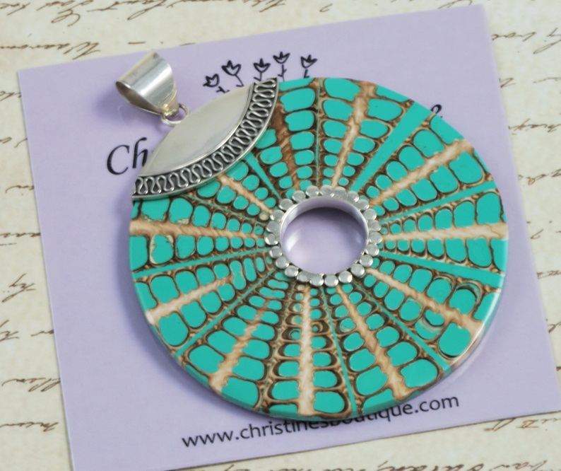 Turquoise Shell Pendant set in 925 Sterling Silver