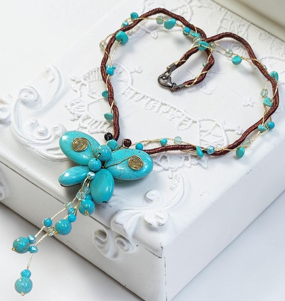 Turquoise howlite butterfly lariat on silk cording