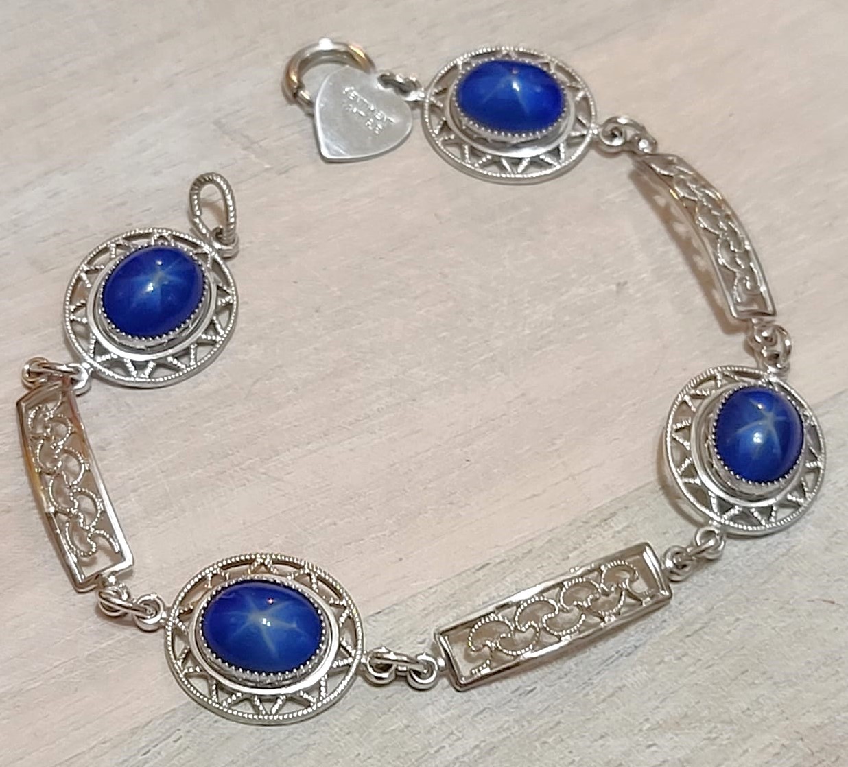 14KT GF bracelet, white gold filled GF with blue stone cabachons, filigree detail, vintage bracelet with heart charm