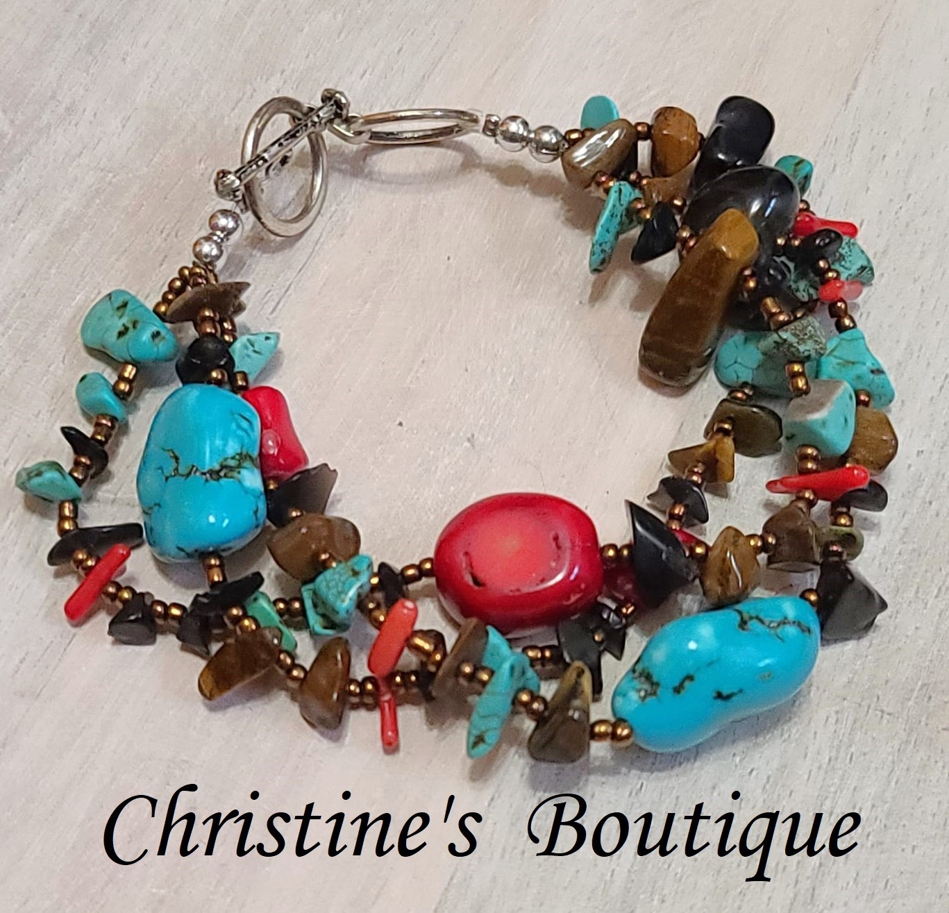 Gemstone nugget bracelet with 3 rows, dyed coral, turquoise, howlite, tiger eye - Click Image to Close