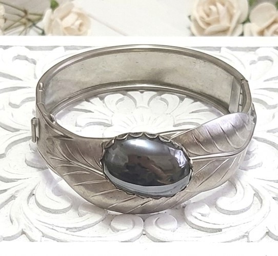 Vintage bangle bracelet with center hematite cabachon