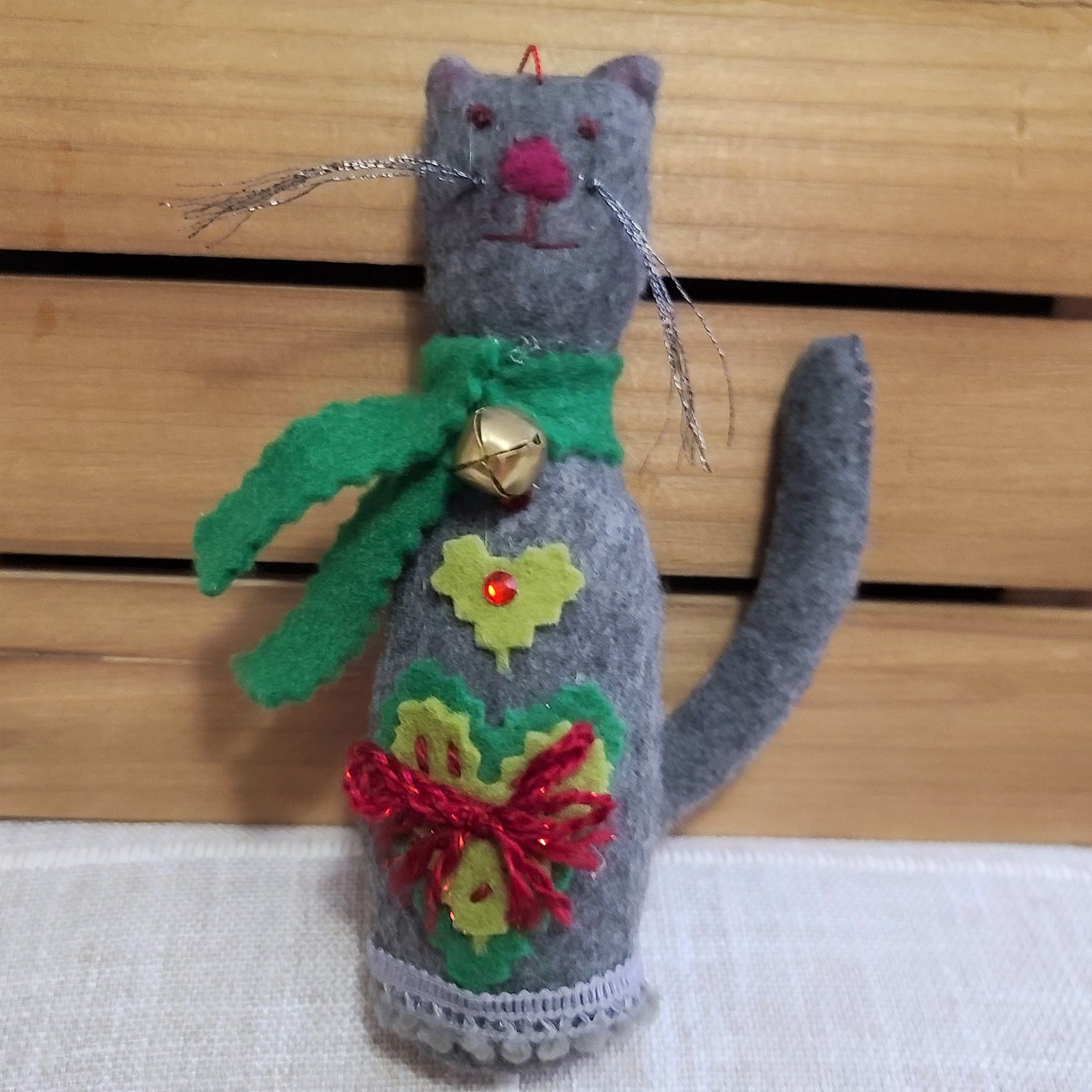 Cat felt ornament - dark gray with red and green accents
