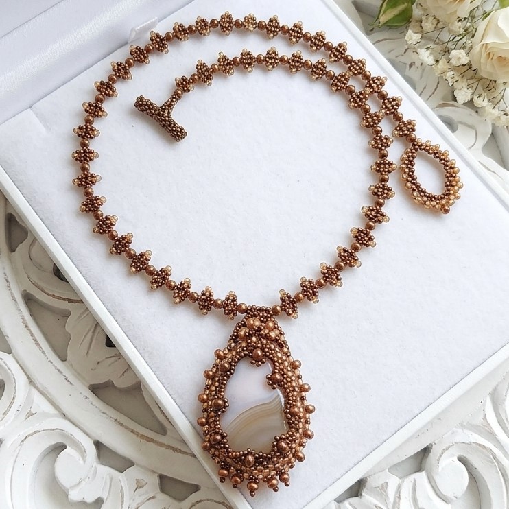 Quartz gemstone pendant necklace with a vintage inspired flair