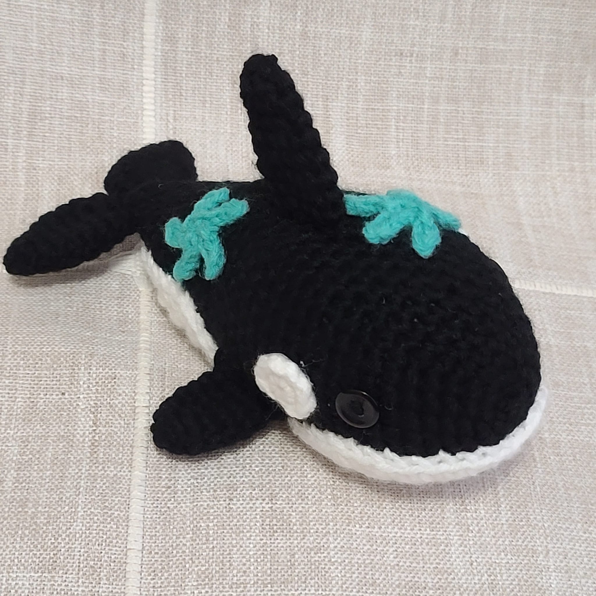 Crochet amigurumi handmade stuffed orca with starfish