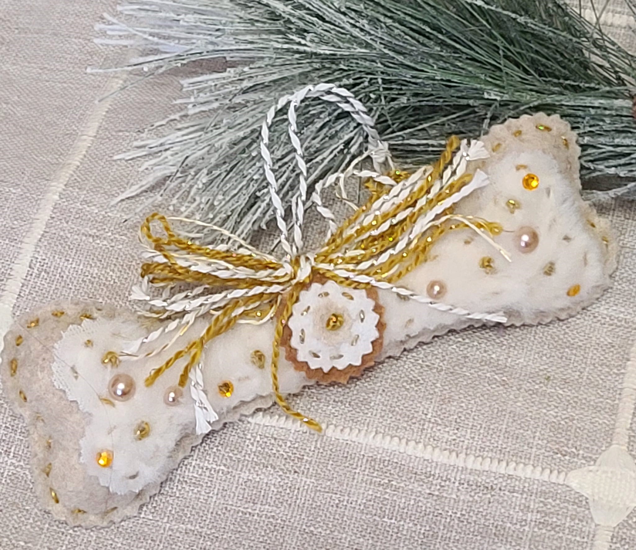 Dog bone ornament cookie dough felt with white icing