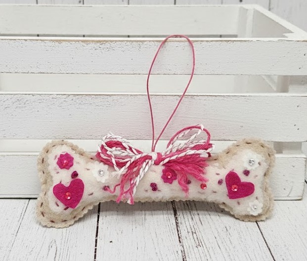 Dog bone ornament gingerbread felt with white fur and pink accen Dog bone ornament gingerbread felt with white fur and pink accen