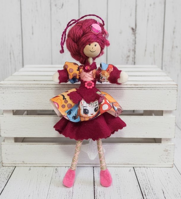 Fushia pink doll with licensed Shopkins fabric as dress