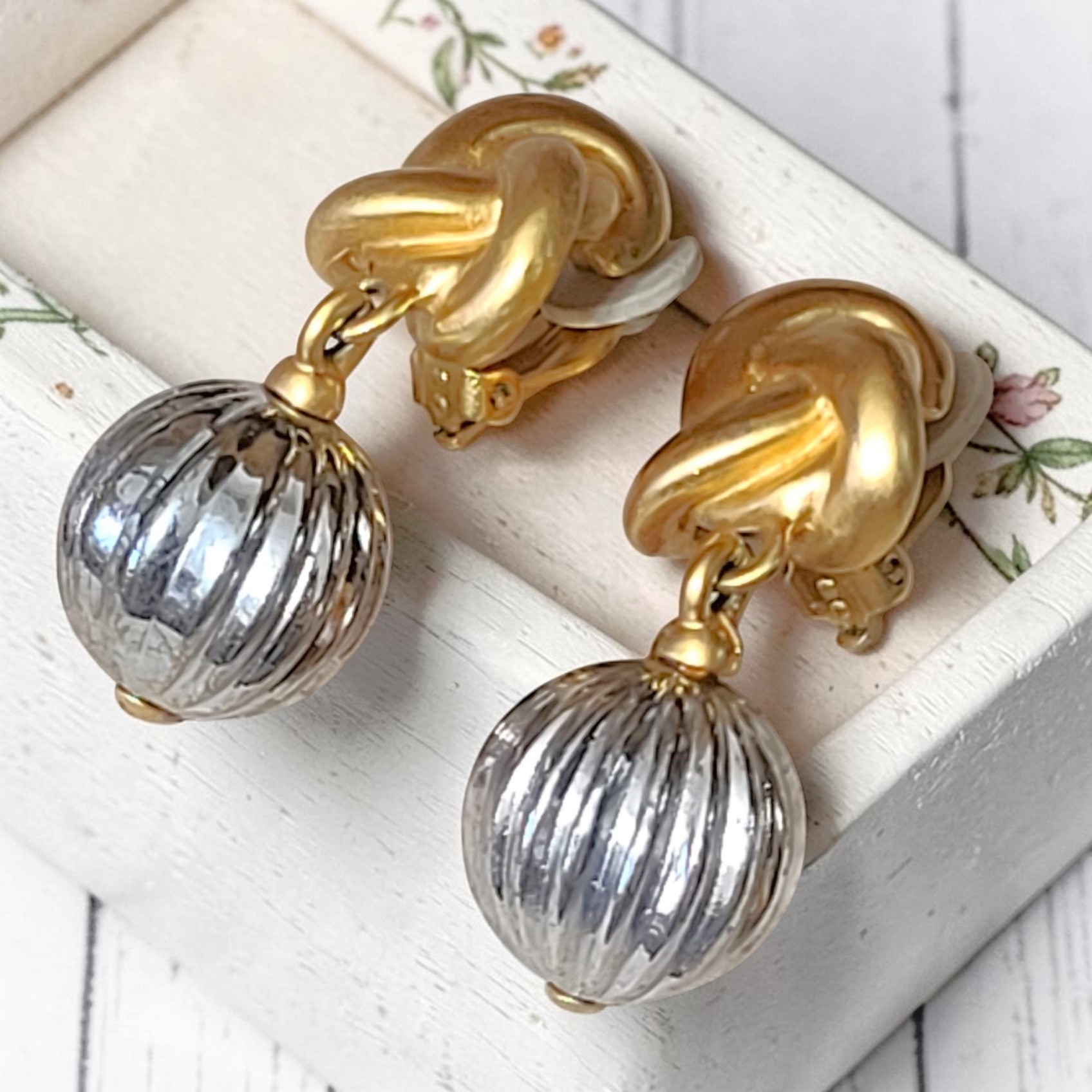 Door knocker earrings, vintage clip ons, silver and gold combination