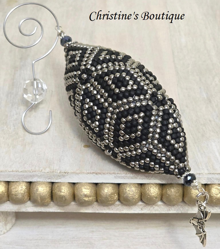 Beaded ornament, handmade, miyuki glass beads, oblong shape. gothic black and silver w/ bat charm