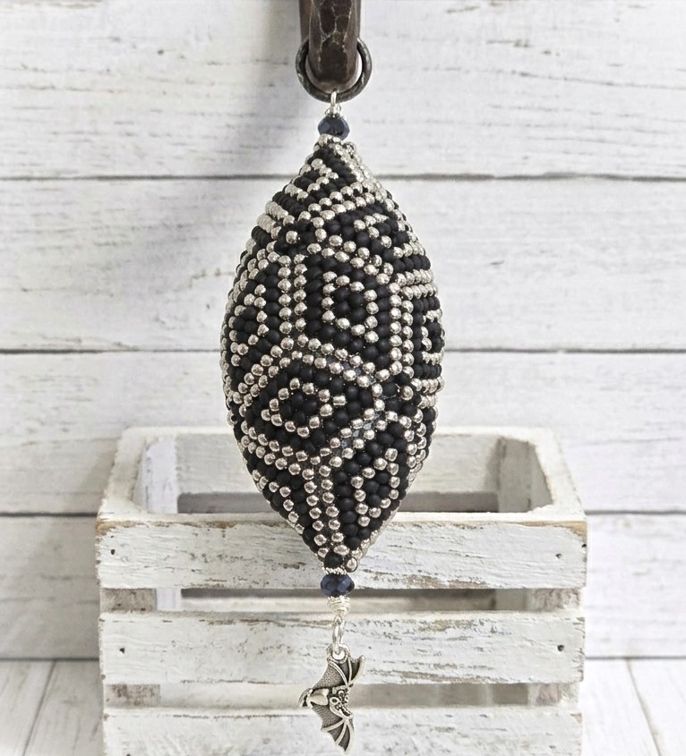 Beaded ornament, handmade, miyuki glass beads, oblong shape. gothic black and silver w/ bat charm