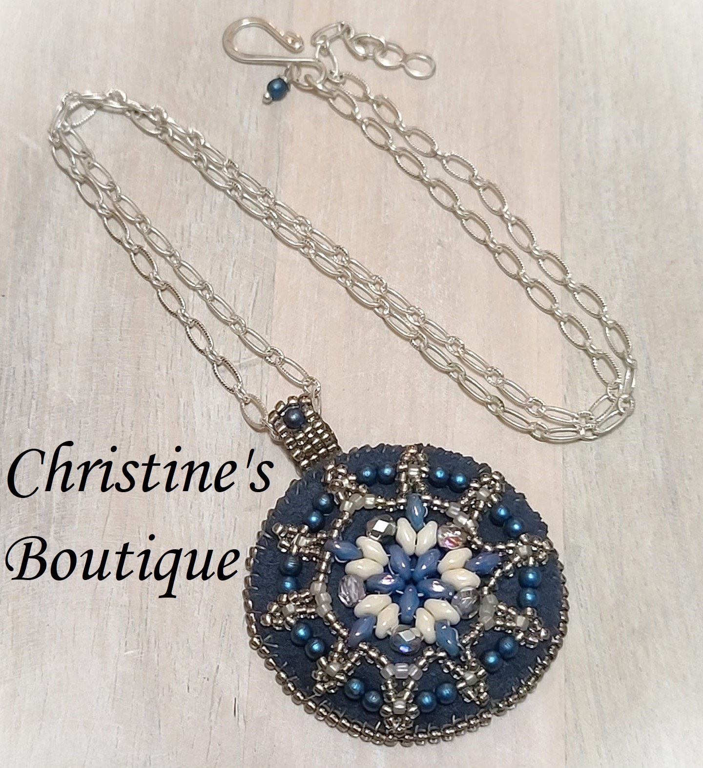 Bead embroidery medallion pendant necklace, blue suede, glass