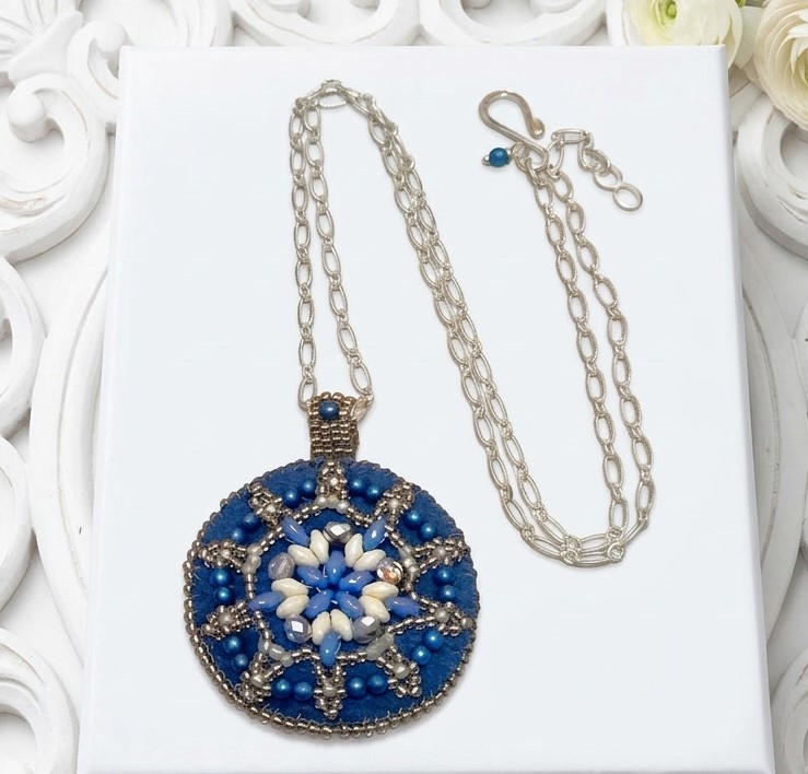 Bead embroidery medallion pendant necklace, blue suede, glass