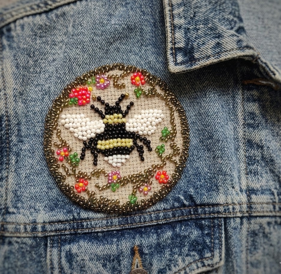 Bumble bee pin with cross stitch and beads