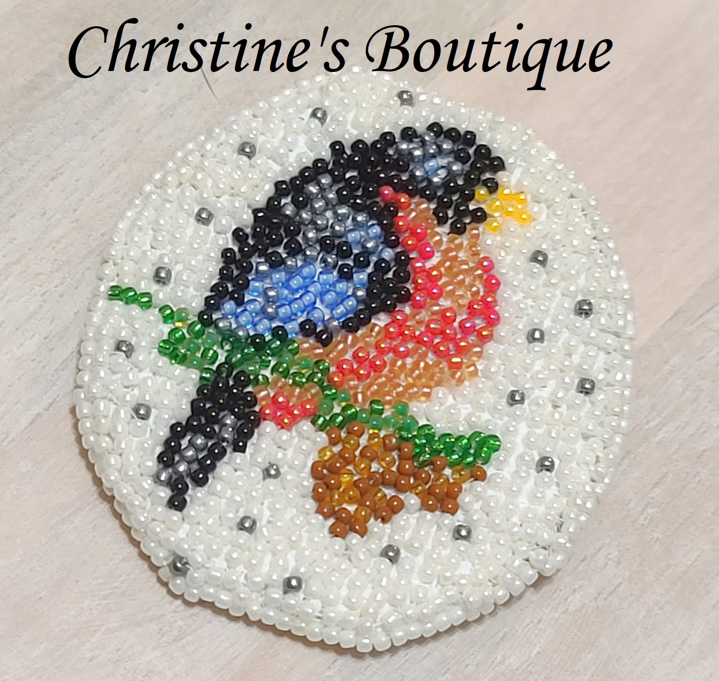 Hand beaded bird on a branch pin - Click Image to Close
