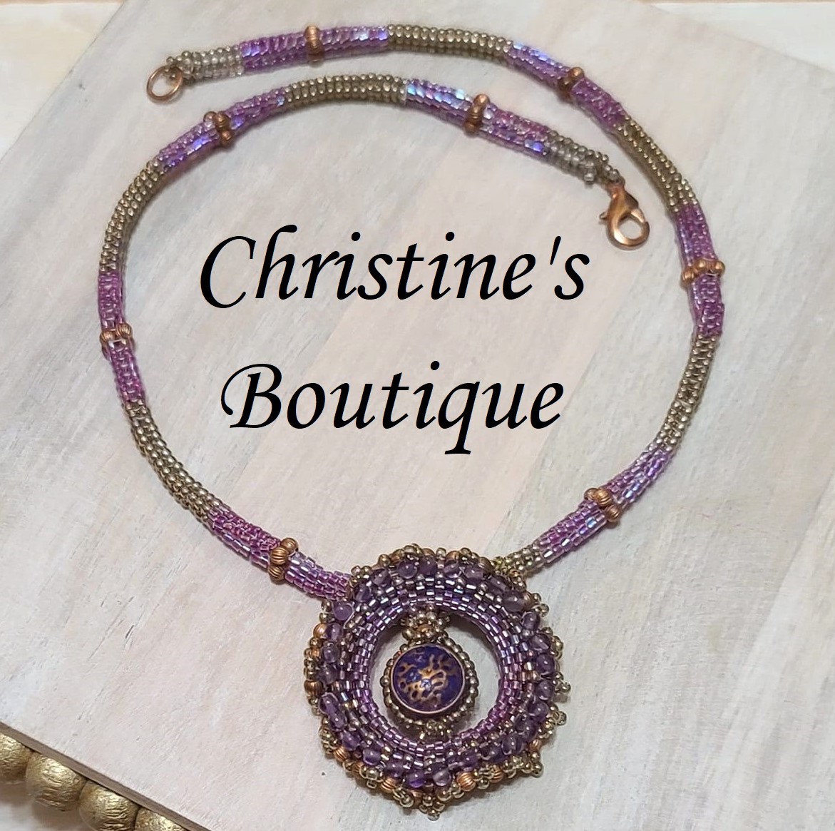 Beaded pendant purple and copper accents, peyote stitch rope - Click Image to Close