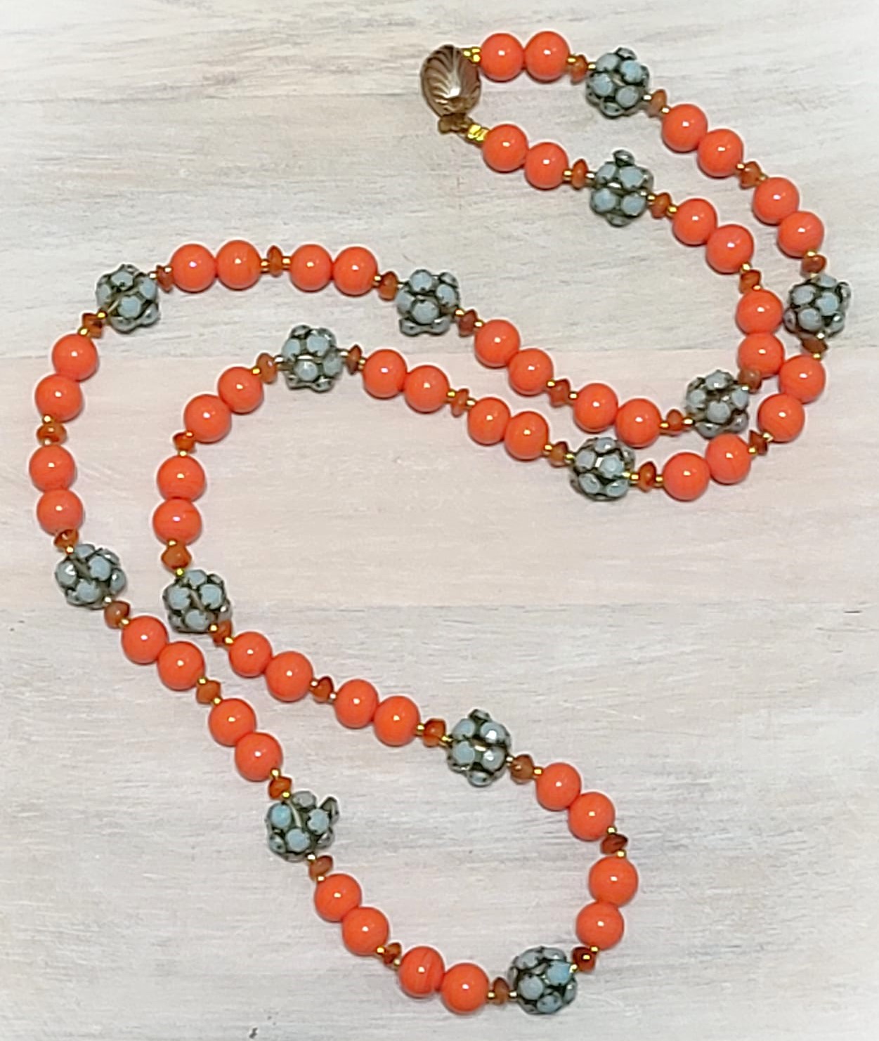 Bead necklace with turquoise and orange vintage scallop clasp