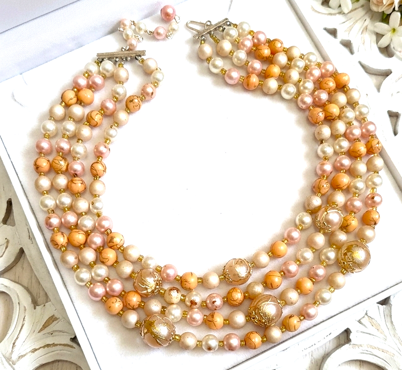 4 Row vintage beaded necklace with pinks,peach and orange hues