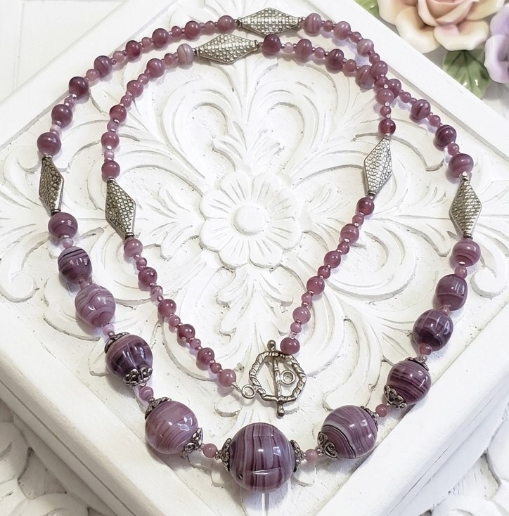 Purple swirl glass bead necklace with textured silver plated diamond shape accents, handcrafted necklace