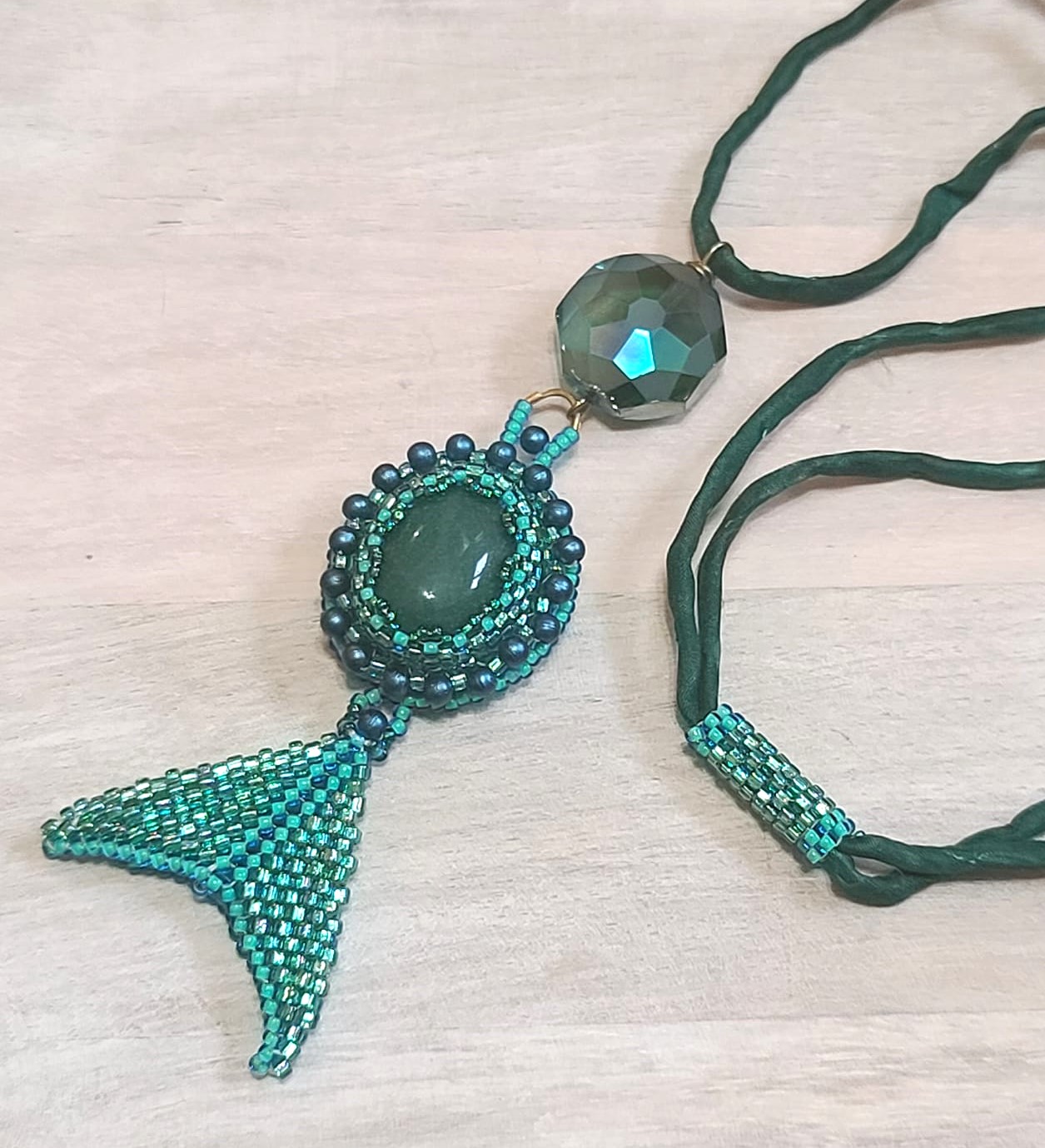 Green aventurine gemstone pendant, handcrafted on silk