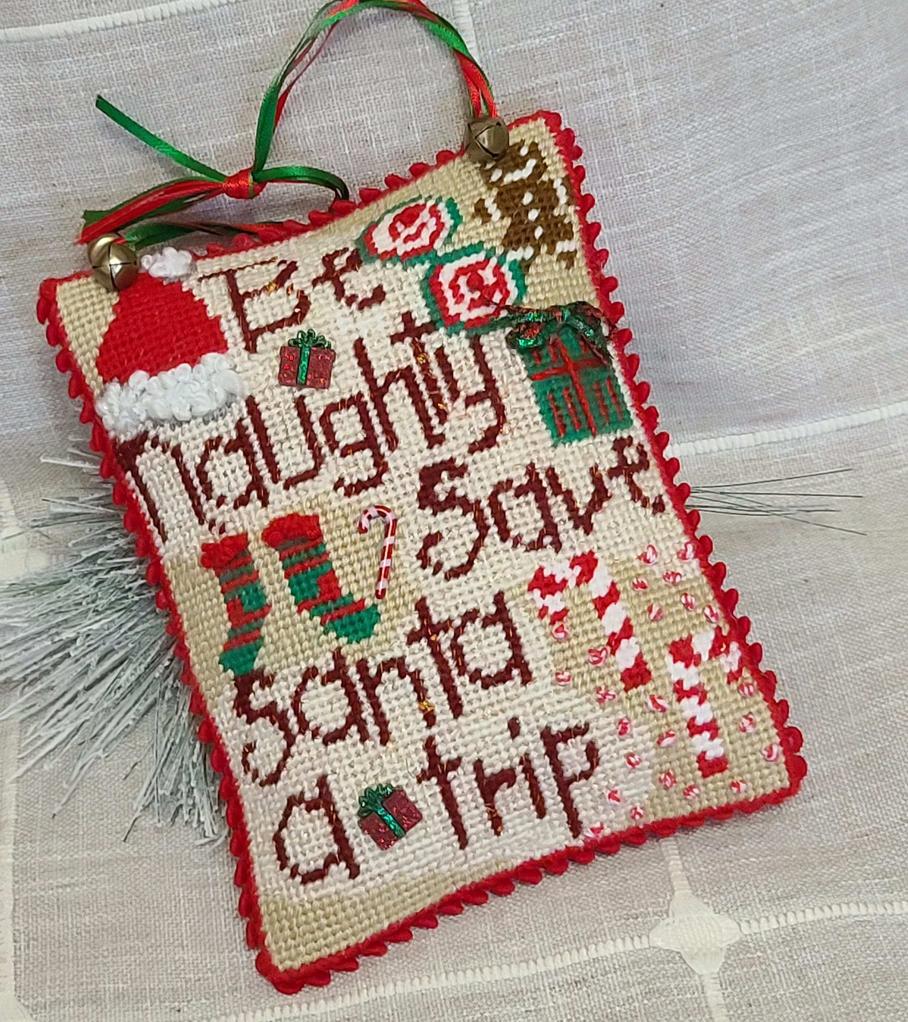 Needlepoint Save Santa a trip with embellisments, door hanger