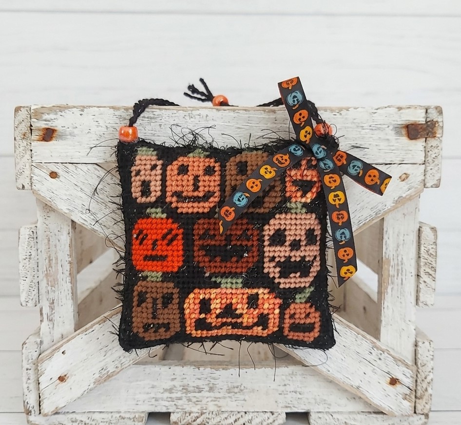 Halloween needlepoint pumpkin faces ornament