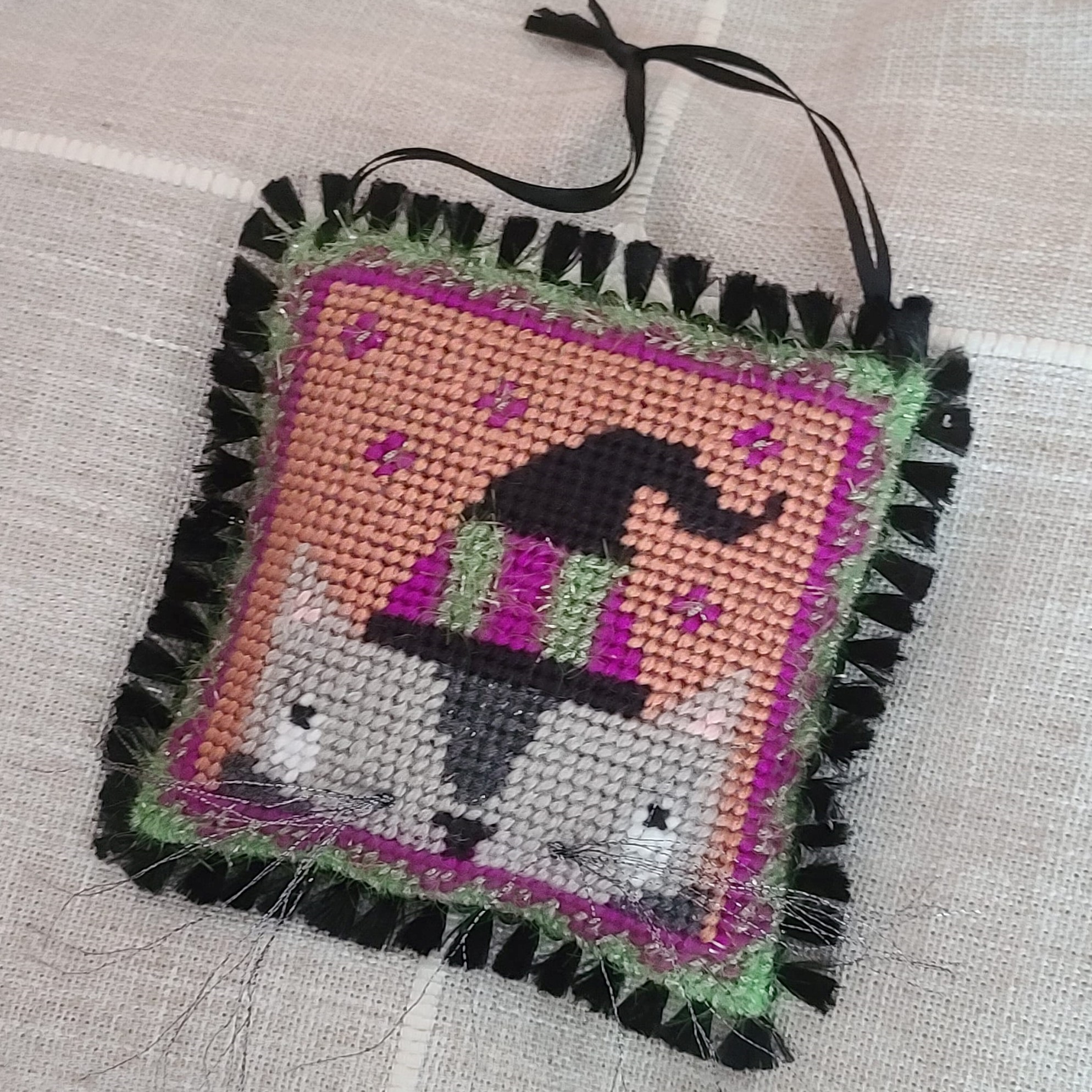 Halloween finished needlepoint Cat with witch hat ornament